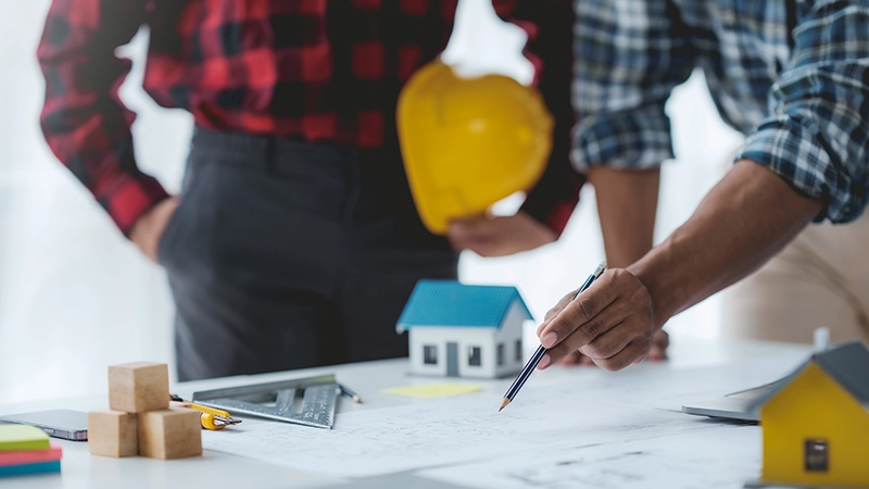 Creative Engineer and Architect Meeting for Collaborative Design and Project Planning in the Workplace.